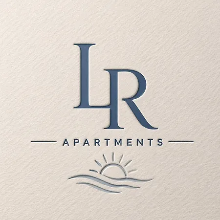 Lr *